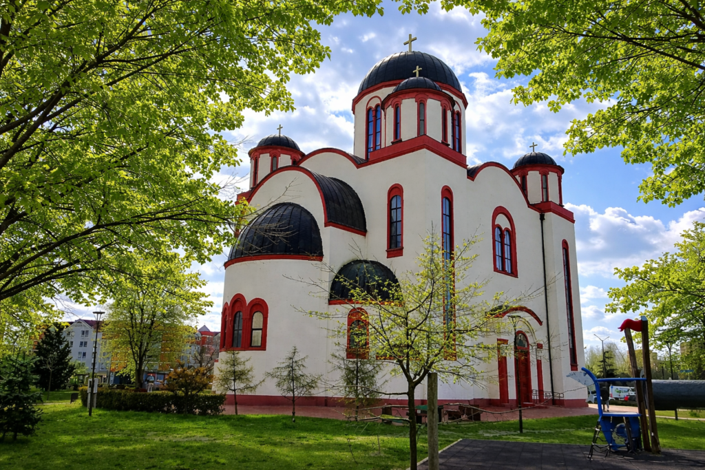 Serbian church surrounded by spring greenery